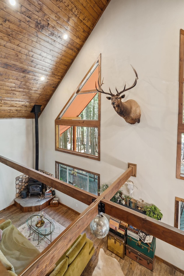 8637 Savannah Way, Shingletown, CA 96088 - living area featuring wood ceiling, wood finished floors, lofted ceiling, a wood stove, and recessed lighting