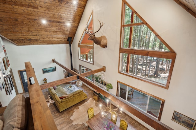 8637 Savannah Way, Shingletown, CA 96088 - living room with high vaulted ceiling, wood ceiling, wood finished floors, and plenty of natural light
