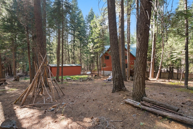 8637 Savannah Way, Shingletown, CA 96088 - view of yard featuring a storage shed
