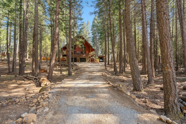 8637 Savannah Way, Shingletown, CA 96088 - view of front of property with asphalt driveway, an attached garage, and a deck