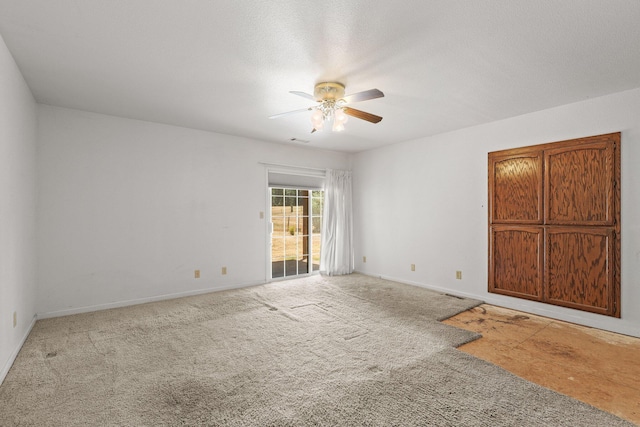 20822 Clough Creek Rd, Redding, CA 96002 - carpeted empty room featuring a ceiling fan and baseboards