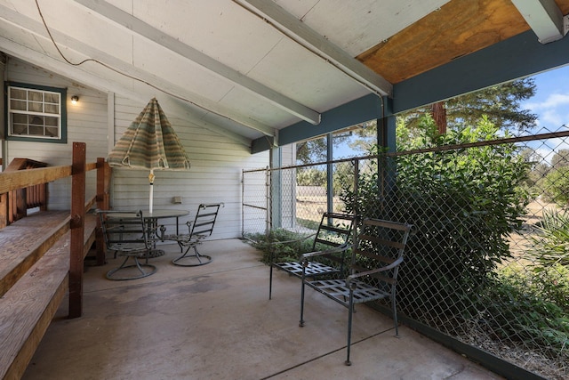 20822 Clough Creek Rd, Redding, CA 96002 - sunroom featuring outdoor dining area and plenty of natural light
