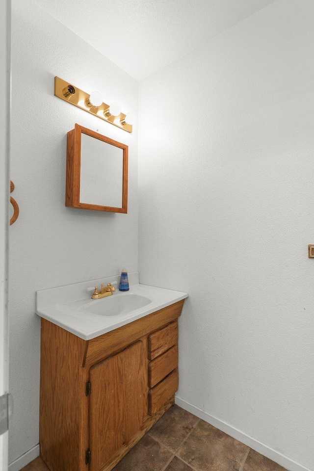 20822 Clough Creek Rd, Redding, CA 96002 - bathroom featuring vanity and tile patterned flooring