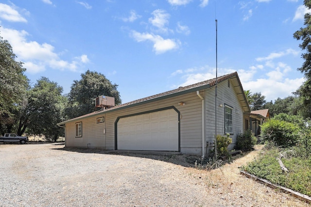 20822 Clough Creek Rd, Redding, CA 96002 - view of property exterior with driveway and an attached garage