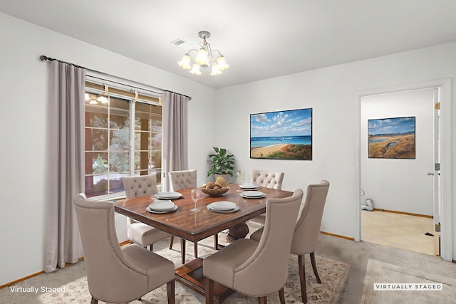 20822 Clough Creek Rd, Redding, CA 96002 - dining space featuring a chandelier and baseboards