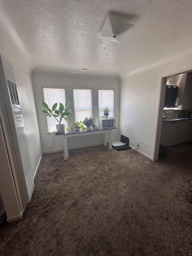 1310 Olive St, Redding, CA 96001 - office featuring plenty of natural light, a textured ceiling, carpet, and a textured wall