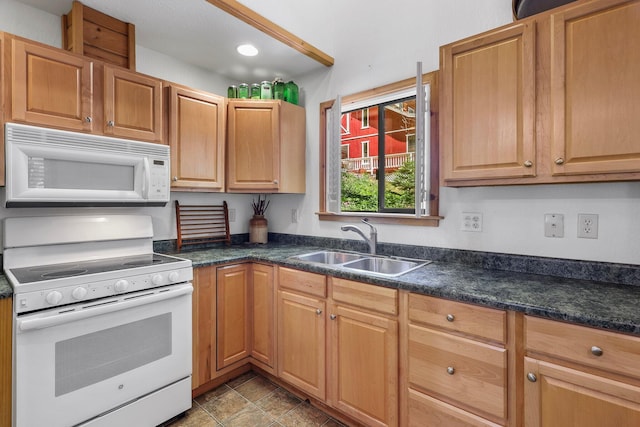 30303 Fremont Way, Oak Run, CA 96069 - kitchen with white appliances and dark countertops