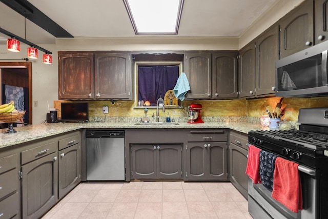 20106 Bonita Way, Redding, CA 96002 - kitchen featuring stainless steel appliances, light tile patterned floors, backsplash, and light stone counters