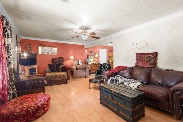 20106 Bonita Way, Redding, CA 96002 - living room featuring wood finished floors, ceiling fan, ornamental molding, and a textured ceiling