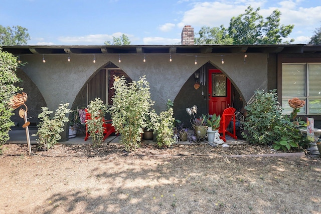 20106 Bonita Way, Redding, CA 96002 - view of front of home with stucco siding and a chimney