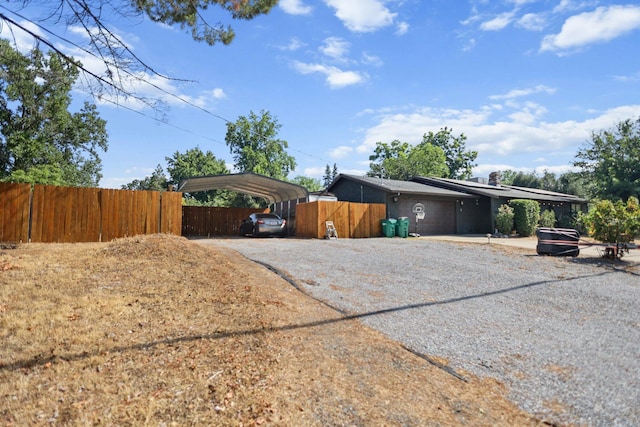 20106 Bonita Way, Redding, CA 96002 - view of front facade with gravel driveway and a carport