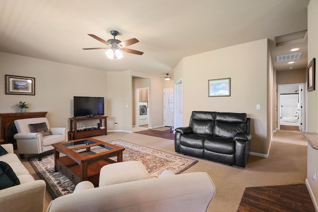 3526 Humbug Dr, Anderson, CA 96007 - living room featuring washer / dryer, a ceiling fan, carpet floors, and wood finished floors