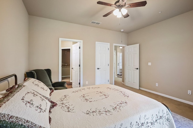 3526 Humbug Dr, Anderson, CA 96007 - bedroom featuring carpet flooring, a walk in closet, and a ceiling fan