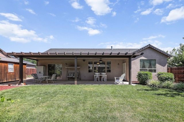 3526 Humbug Dr, Anderson, CA 96007 - back of house with a ceiling fan, stucco siding, and a patio area
