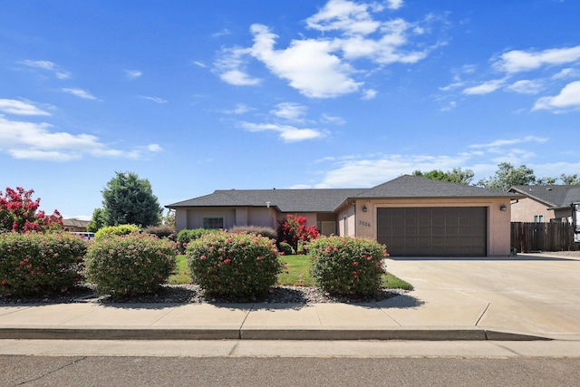 3526 Humbug Dr, Anderson, CA 96007 - ranch-style home with a garage, stucco siding, and driveway