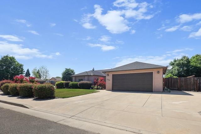 3526 Humbug Dr, Anderson, CA 96007 - view of front facade featuring driveway, stucco siding, and an attached garage