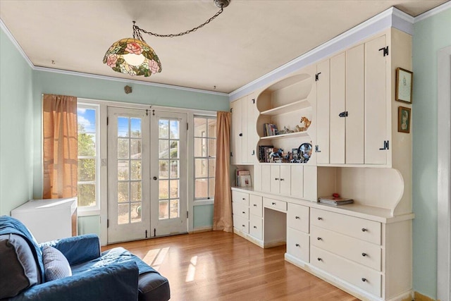 1120 Franklin St, Red Bluff, CA 96080 - living area with french doors, crown molding, light wood-type flooring, and an office area