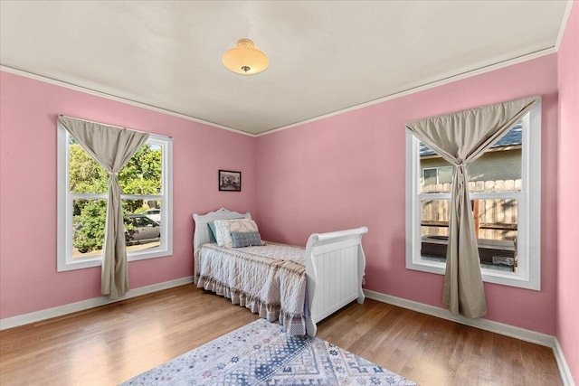 1120 Franklin St, Red Bluff, CA 96080 - bedroom featuring wood finished floors and ornamental molding