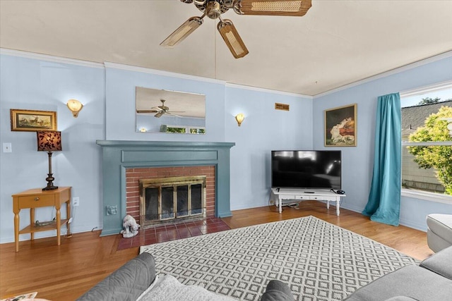 1120 Franklin St, Red Bluff, CA 96080 - living room with a ceiling fan, crown molding, a brick fireplace, and wood finished floors