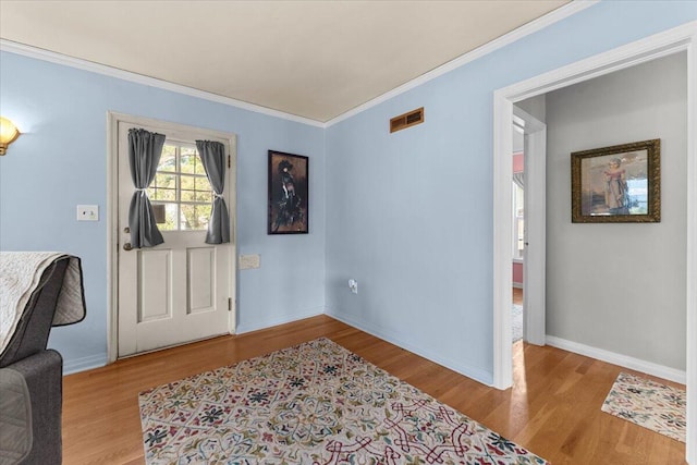 1120 Franklin St, Red Bluff, CA 96080 - entryway with crown molding and wood finished floors