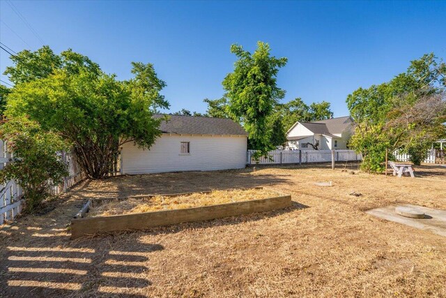 1120 Franklin St, Red Bluff, CA 96080 - fenced backyard with a garden
