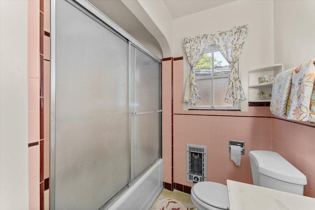 1120 Franklin St, Red Bluff, CA 96080 - full bath with heating unit, combined bath / shower with glass door, and tile walls