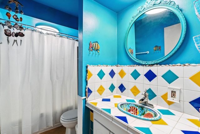 19078 Gravel Plant Rd, Redding, CA 96002 - bathroom featuring vanity and tasteful backsplash