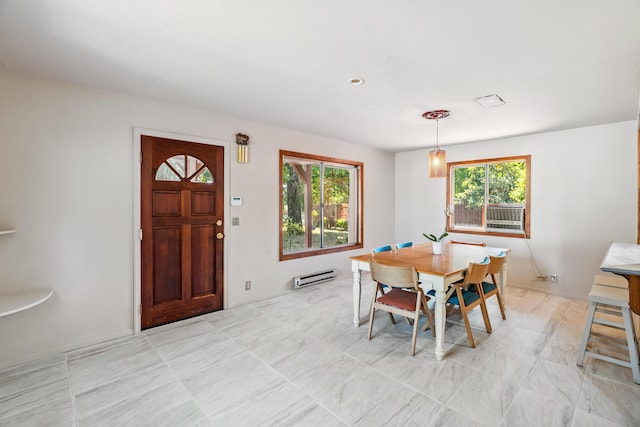 19078 Gravel Plant Rd, Redding, CA 96002 - dining room featuring baseboard heating and healthy amount of natural light