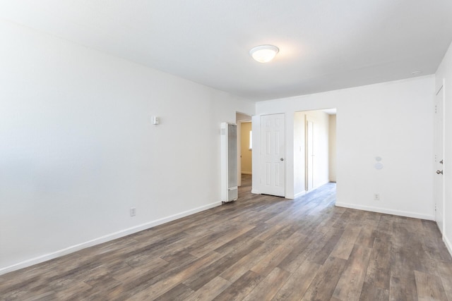 3252 Daisy St, Anderson, CA 96007 - unfurnished room with a heating unit and dark wood finished floors