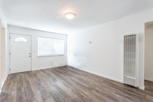 3252 Daisy St, Anderson, CA 96007 - foyer entrance featuring a heating unit, wood finished floors, and plenty of natural light