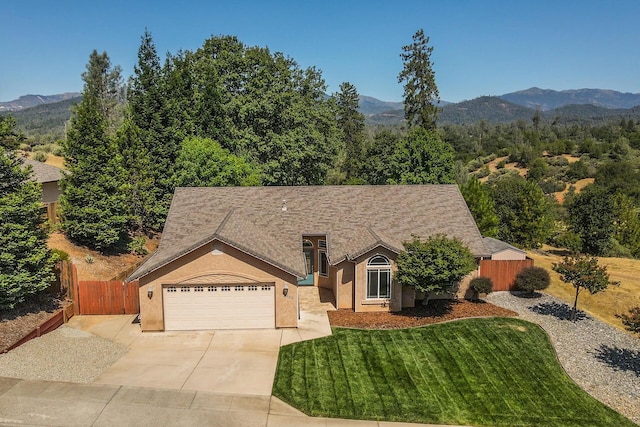 2926 Chaucer Way, Shasta Lake, CA 96019 - single story home featuring stucco siding, driveway, a garage, and a mountain view