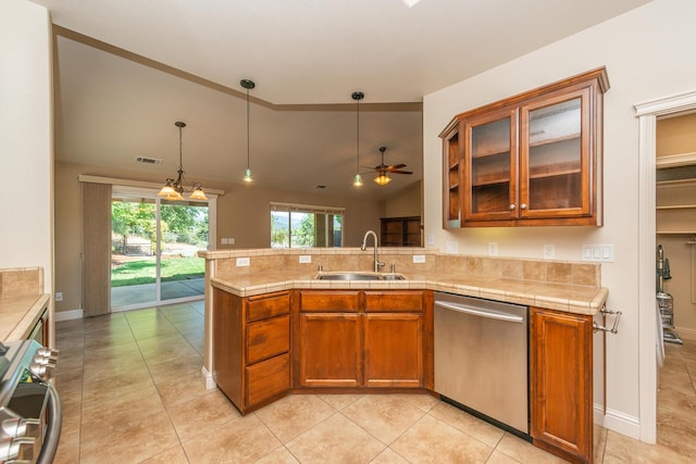 2926 Chaucer Way, Shasta Lake, CA 96019 - kitchen with stainless steel dishwasher, stove, lofted ceiling, a ceiling fan, and brown cabinetry