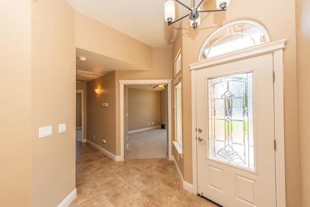 2926 Chaucer Way, Shasta Lake, CA 96019 - entryway with light tile patterned flooring and a chandelier