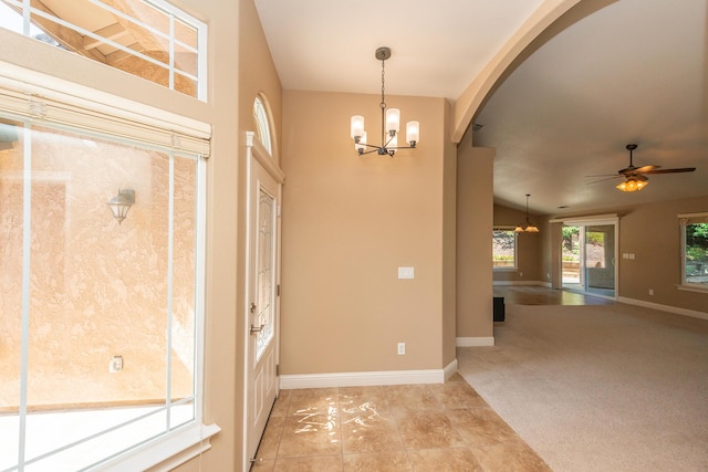 2926 Chaucer Way, Shasta Lake, CA 96019 - foyer featuring a chandelier, arched walkways, ceiling fan, and light carpet