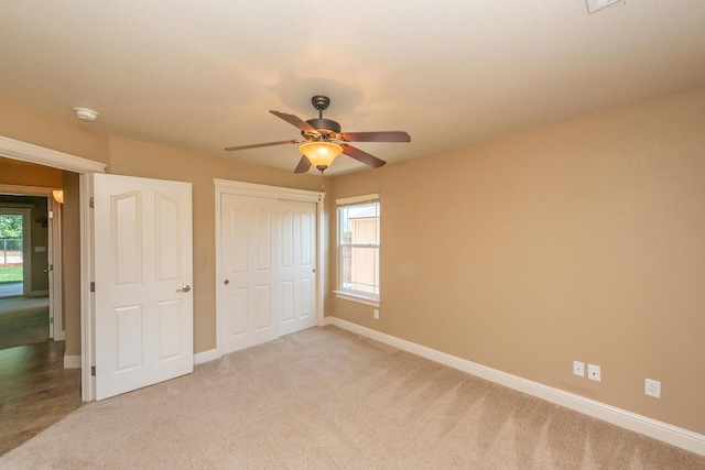 2926 Chaucer Way, Shasta Lake, CA 96019 - unfurnished bedroom featuring a closet, ceiling fan, and light colored carpet