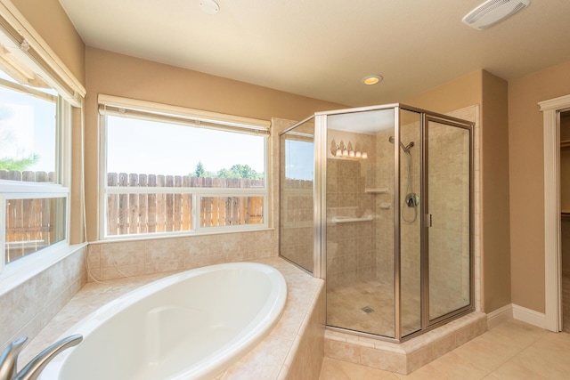 2926 Chaucer Way, Shasta Lake, CA 96019 - bathroom featuring a bath, a shower stall, tile patterned flooring, healthy amount of natural light, and recessed lighting