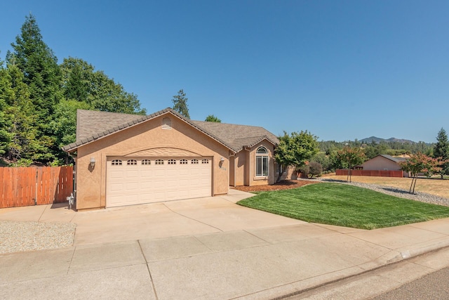 2926 Chaucer Way, Shasta Lake, CA 96019 - ranch-style home with concrete driveway, stucco siding, and an attached garage