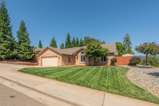 2926 Chaucer Way, Shasta Lake, CA 96019 - ranch-style house featuring stucco siding, an attached garage, and concrete driveway