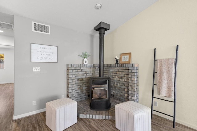 2820 Howard Dr, Redding, CA 96001 - detailed view of a wood stove, wood finished floors, and recessed lighting