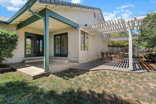 2820 Howard Dr, Redding, CA 96001 - rear view of property with a patio area, a pergola, and stucco siding