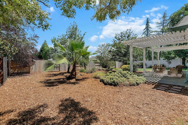 2820 Howard Dr, Redding, CA 96001 - fenced backyard with a pergola and a patio area