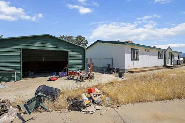 3287 Yolla Bolly Rd, Igo, CA 96047 - view of property exterior with a garage and an outbuilding