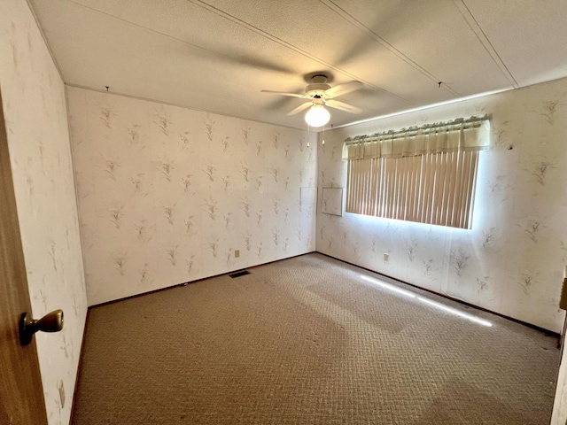 4784 White River Dr, Redding, CA 96003 - carpeted spare room featuring ceiling fan and wallpapered walls