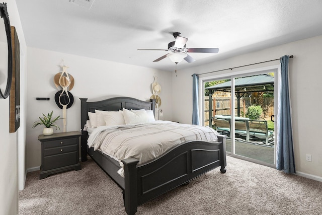 3525 Humbug Dr, Anderson, CA 96007 - bedroom featuring access to exterior, carpet flooring, and ceiling fan