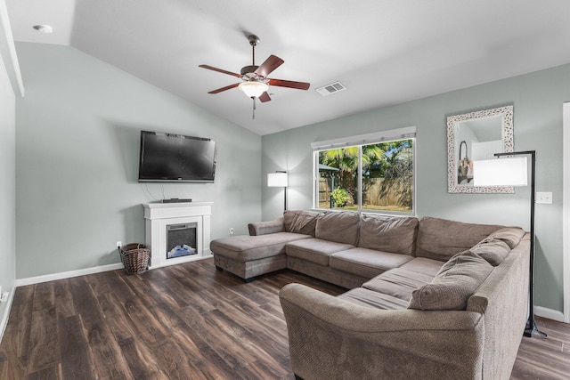 3525 Humbug Dr, Anderson, CA 96007 - living area featuring lofted ceiling, a ceiling fan, wood finished floors, and a fireplace