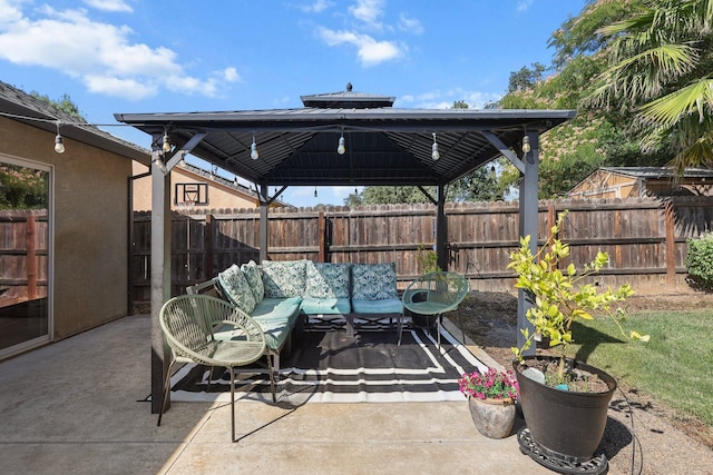 3525 Humbug Dr, Anderson, CA 96007 - fenced backyard featuring a gazebo, a patio area, and outdoor lounge area