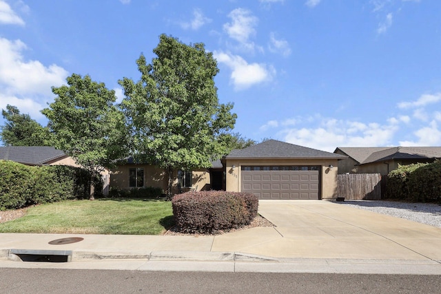 3525 Humbug Dr, Anderson, CA 96007 - view of front facade featuring a garage, driveway, and stucco siding