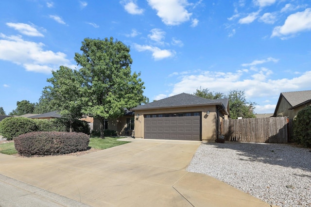 3525 Humbug Dr, Anderson, CA 96007 - ranch-style house featuring driveway, a garage, and stucco siding