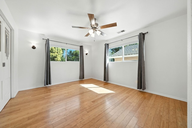 3351 Nicolet Ln, Redding, CA 96001 - unfurnished room with a ceiling fan and light wood-style flooring