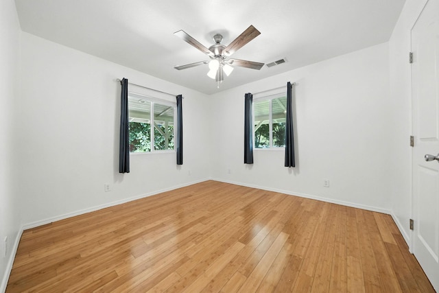 3351 Nicolet Ln, Redding, CA 96001 - unfurnished room featuring plenty of natural light, light wood-style flooring, and a ceiling fan